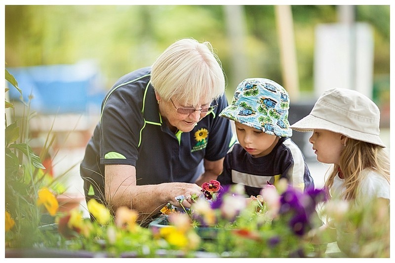 First Class Education and Care_Childcare Tauranga_Children Gardening with Teacher